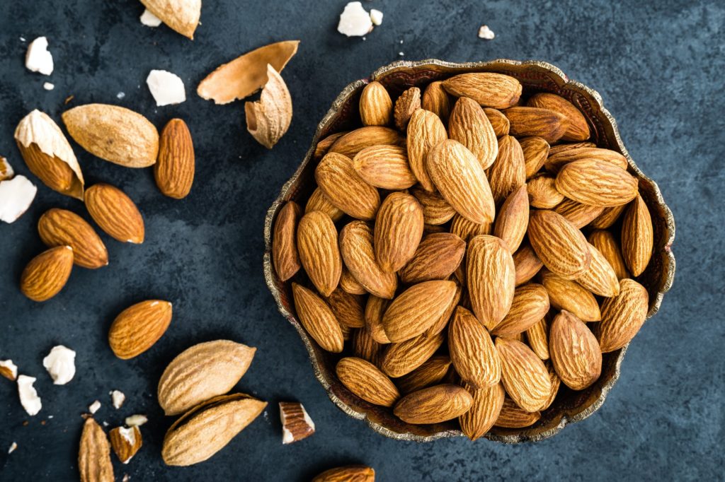 Almond nuts in bowl. Almonds