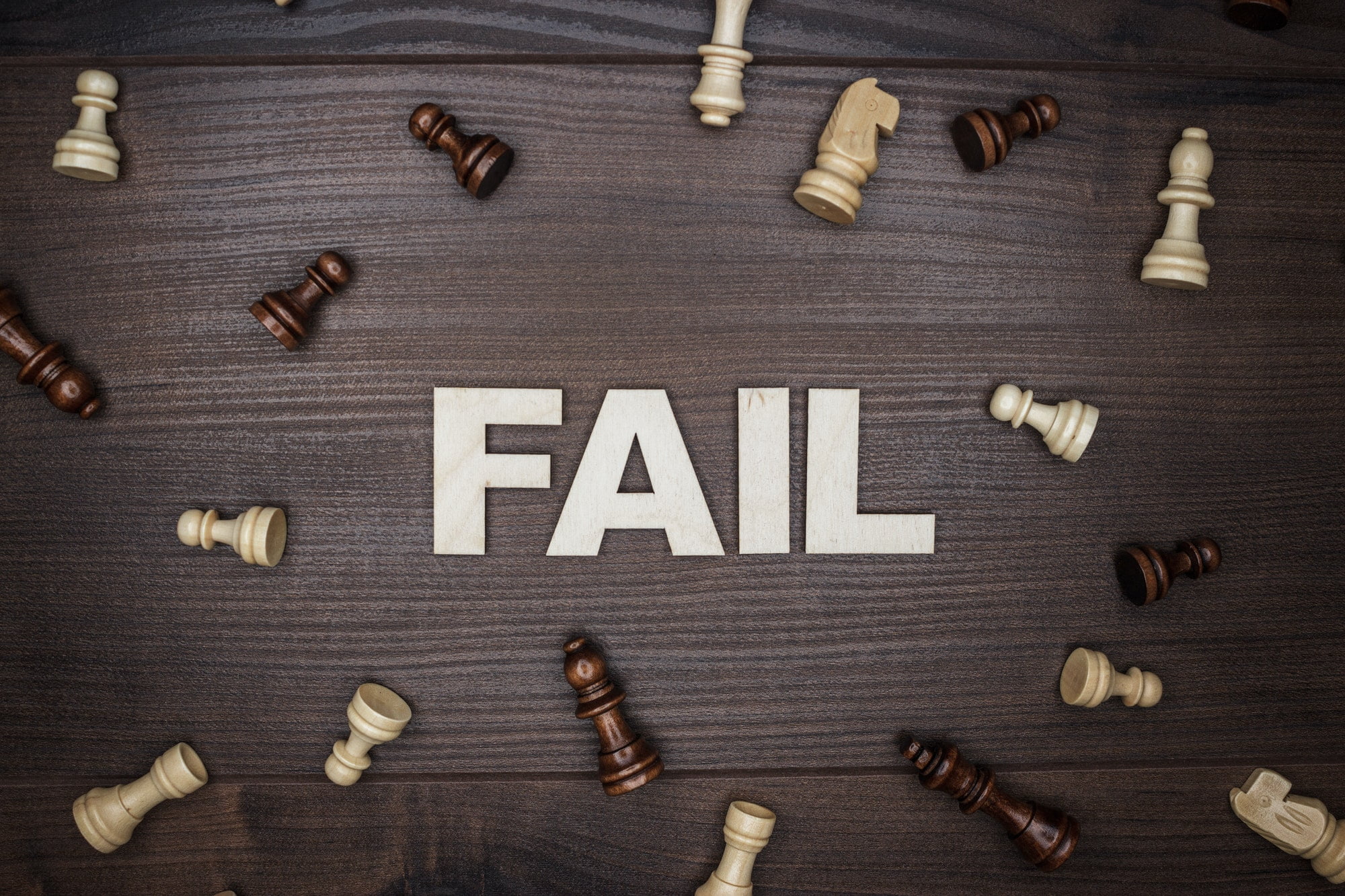 Fail Concept On Wooden Background