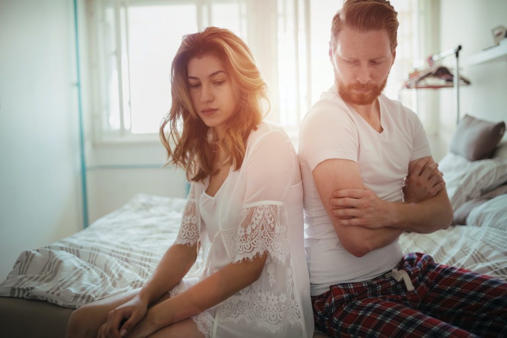 Stressed couple arguing and having marriage problems